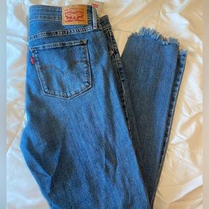 Levi’s raw hem jeans
